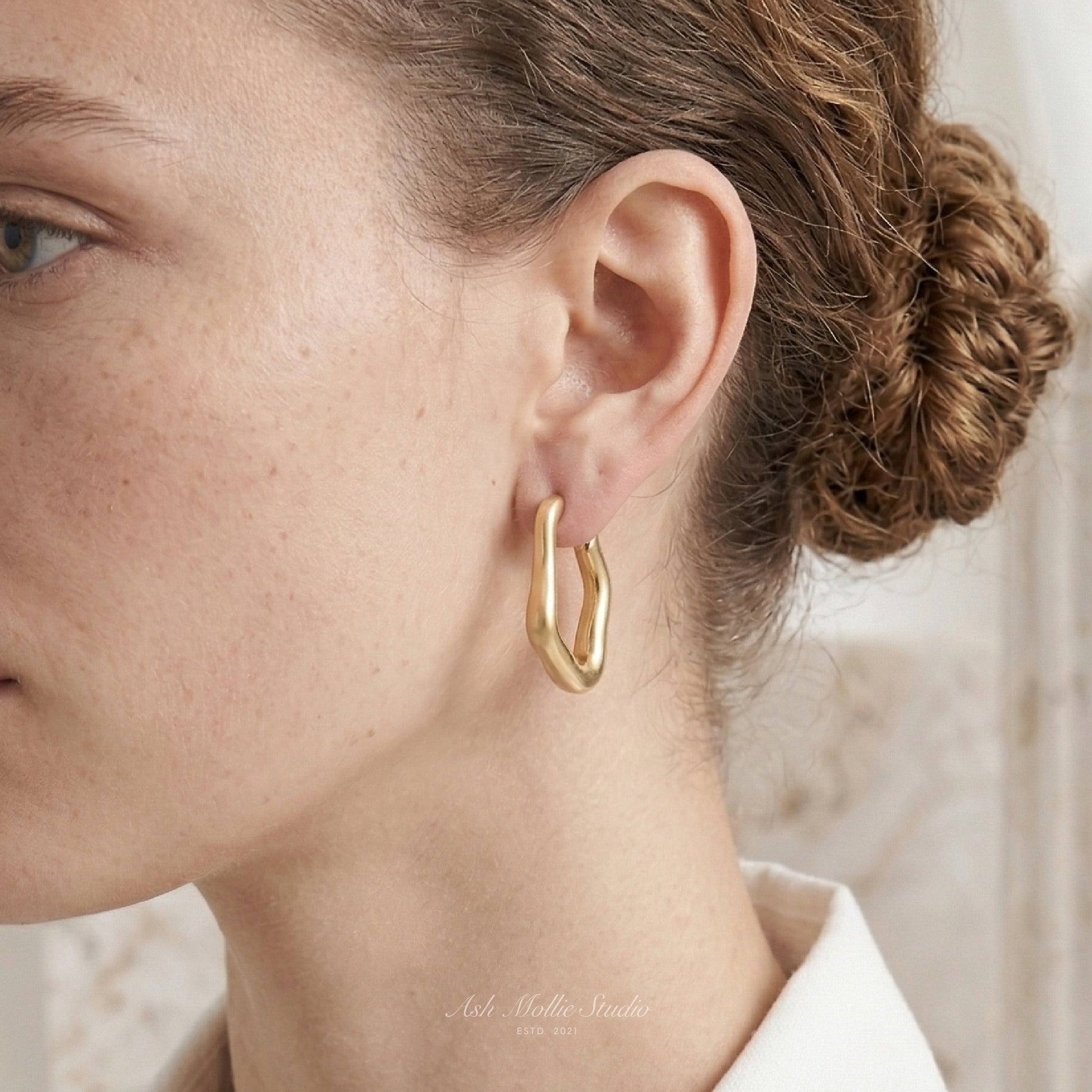 HESTIA Minimalist Brushes Gold Uneven Oval Hoop Earrings – Vintage Inspired Everyday Jewelry | Ash Mollie Studio - ASH MOLLIE STUDIO