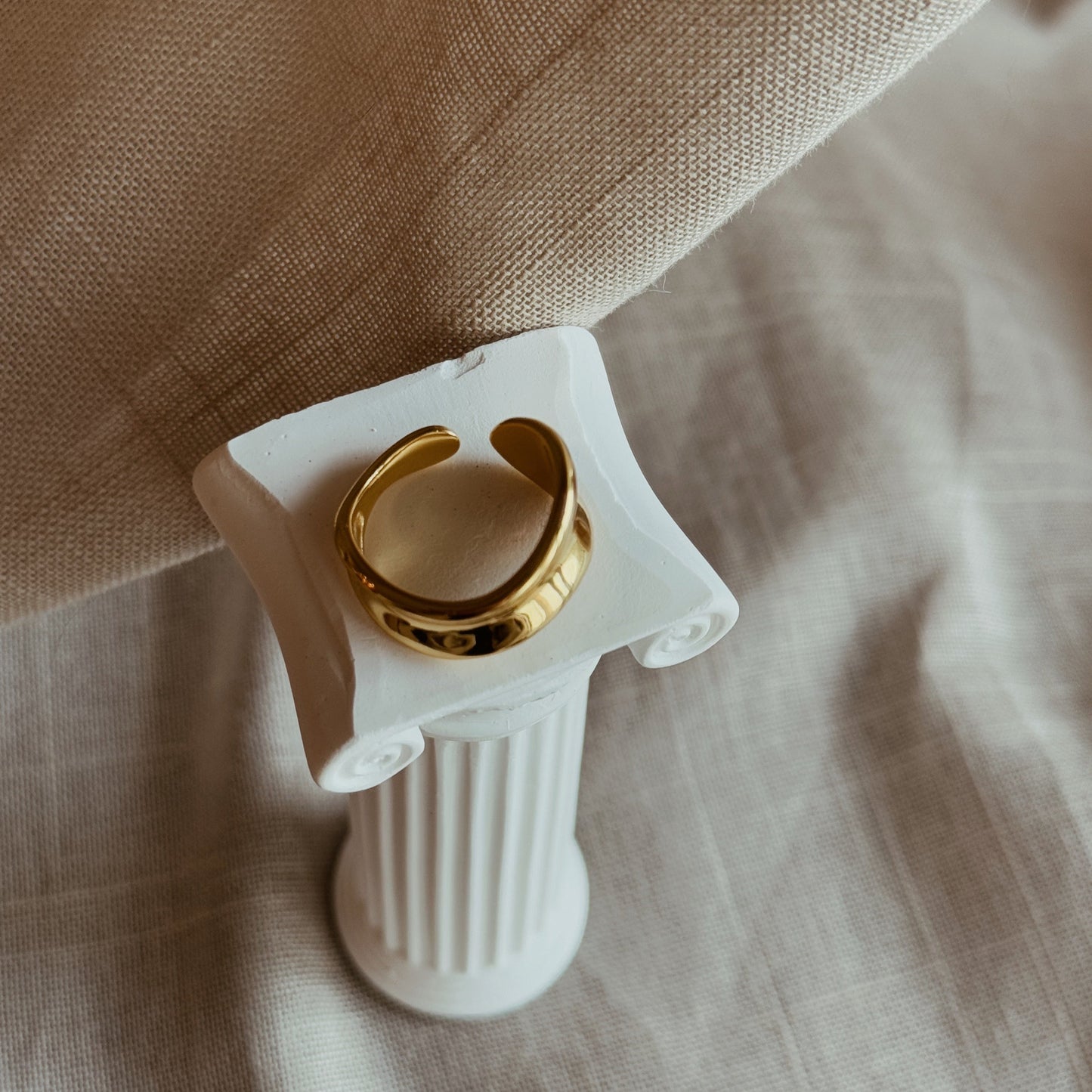 Gold plated wave ring with a bold, adjustable design