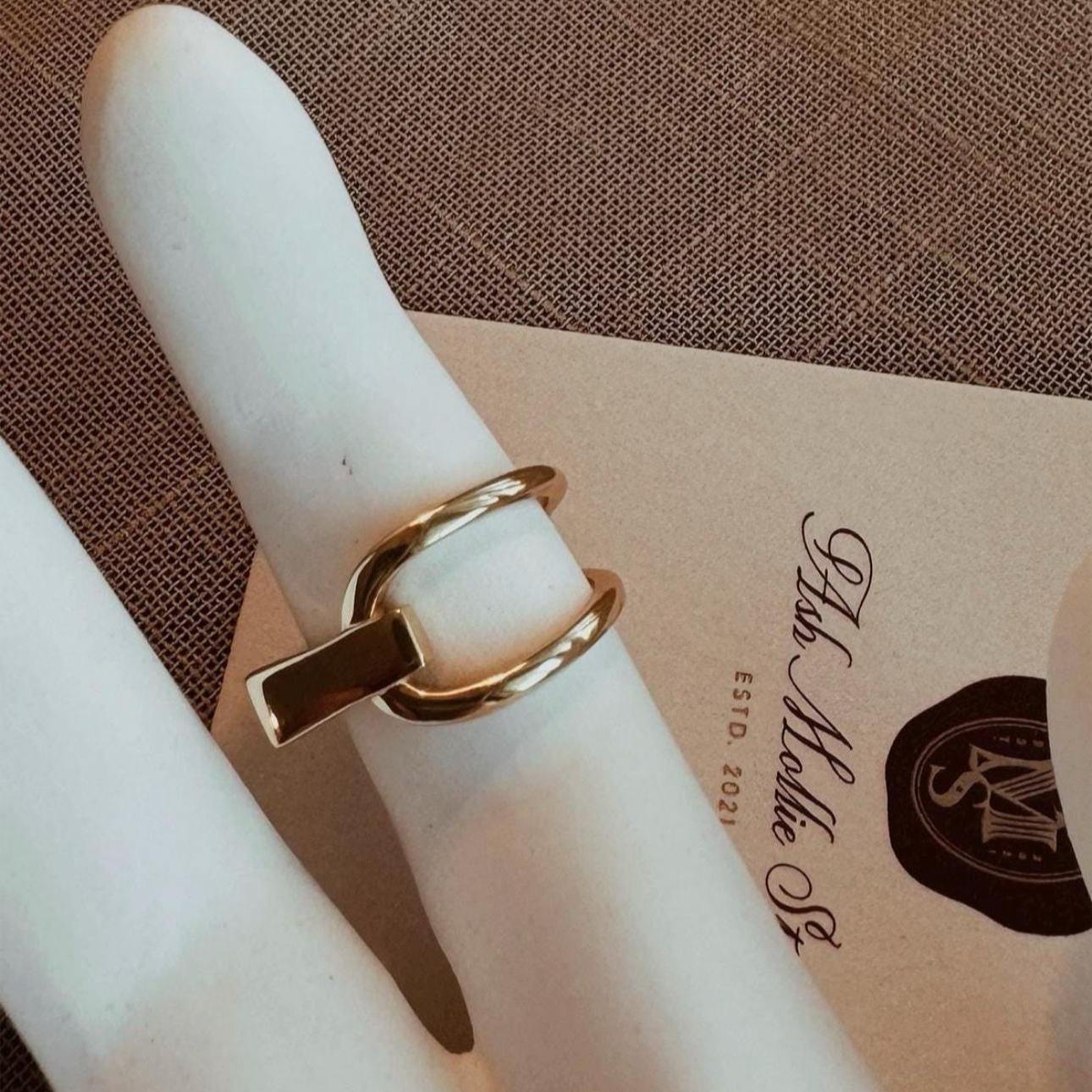 Rectangular gold ring with bold statement design