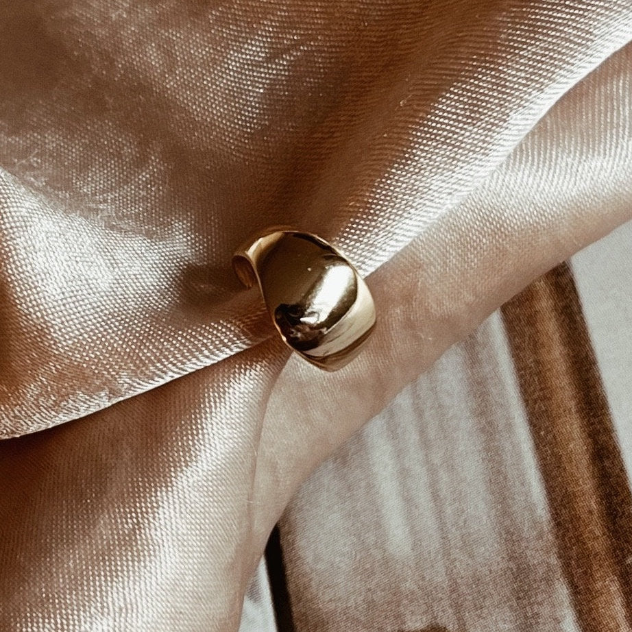 Gold and silver ear cuff in minimalist style