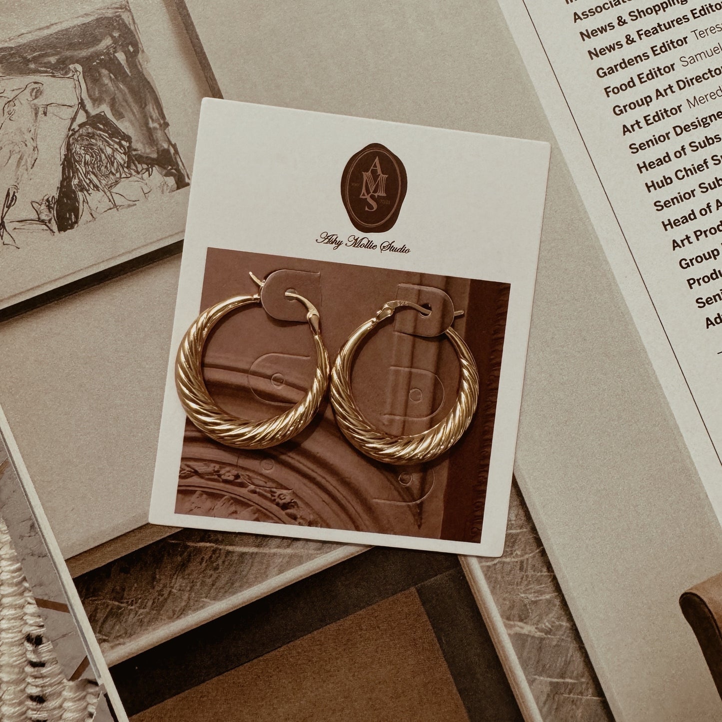 Small gold-plated vintage hoop earrings with spiral texture