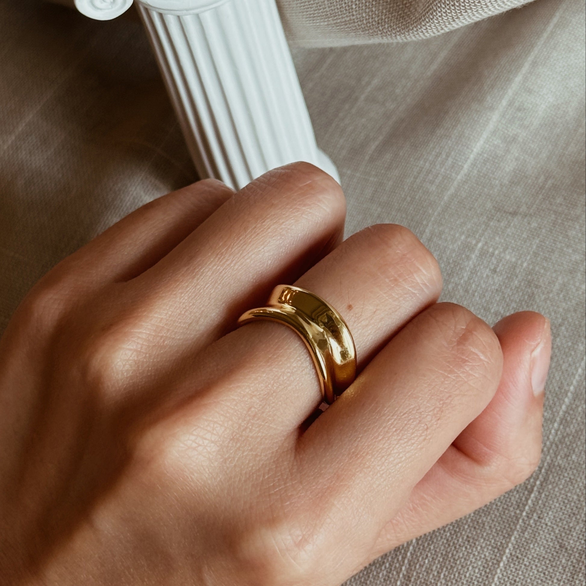 Gold plated wave ring with a bold, adjustable design