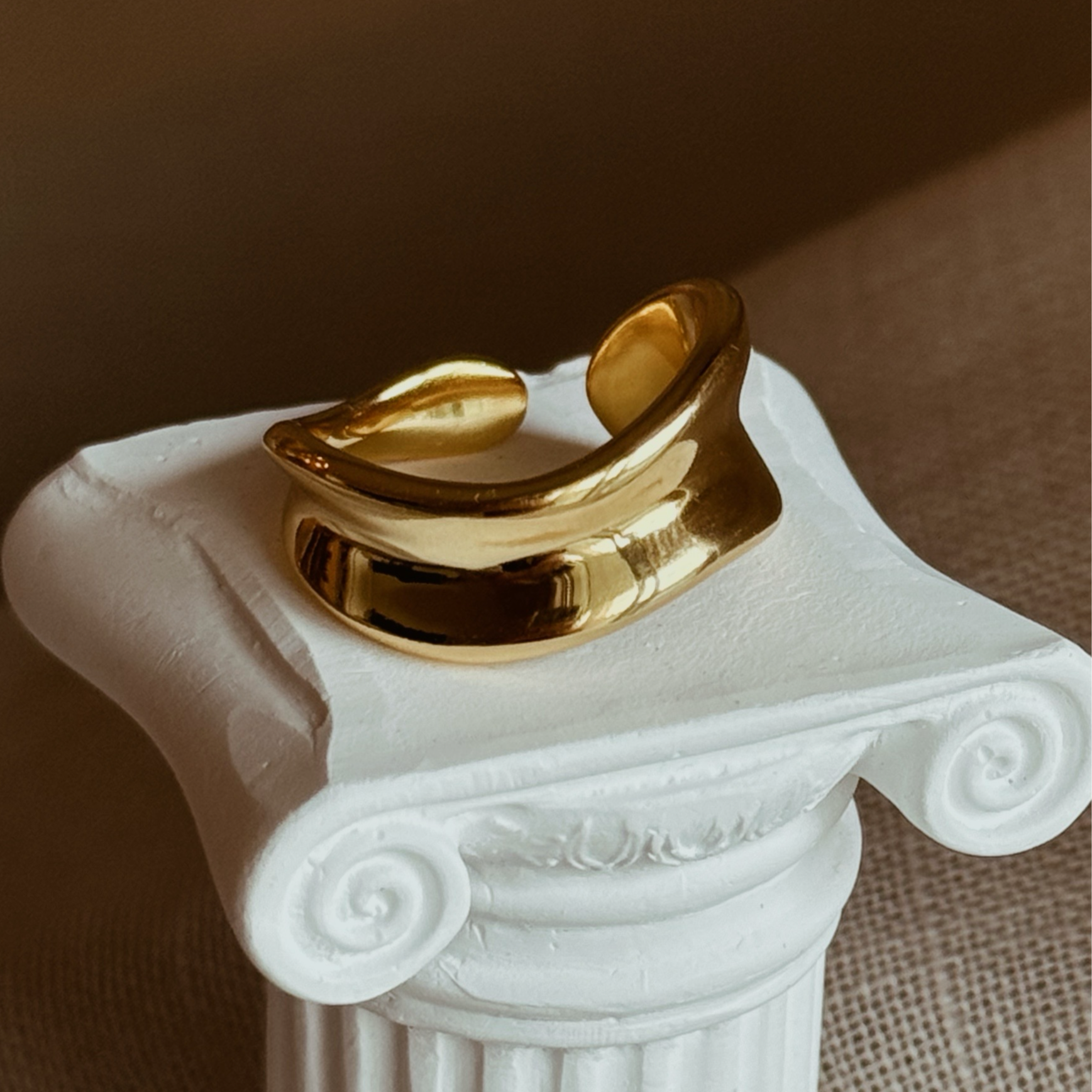 Gold plated wave ring with a bold, adjustable design