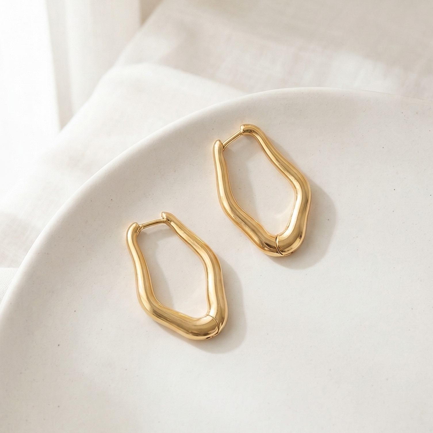 HESTIA Minimalist Brushes Gold Uneven Oval Hoop Earrings – Vintage Inspired Everyday Jewelry | Ash Mollie Studio - ASH MOLLIE STUDIO